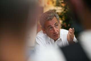 Sarkozy (photographié ici le 24 juillet) soutient Raoult, 