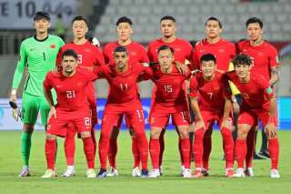 La sélection chinoise pour une photo de groupe lors du match de football des qualifications asiatiques de la Coupe du monde 2022 au Qatar