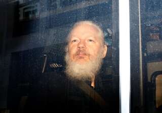 WikiLeaks founder Julian Assange is seen in a police van, after he was arrested by British police, in London, Britain April 11, 2019. REUTERS/Henry Nicholls