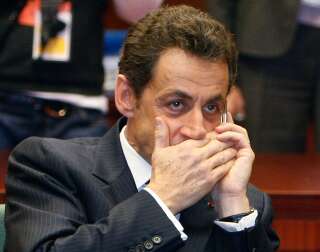 Nicolas Sarkozy, ici au téléphone lors d'un sommet européen de 2009, est au coeur de l'affaire dite des écoutes.