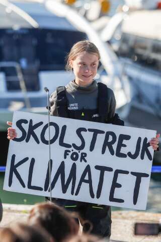 Climate activist Greta Thunberg holds a 