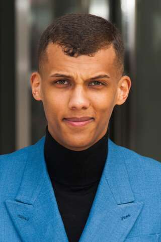 Stromae arriving for the Louis Vuitton Fall/Winter 2015-2016 Ready-To-Wear collection show held at Fondation Louis Vuitton in Paris, France on March 11, 2015. Photo by Nicolas Genin/Sipa USA