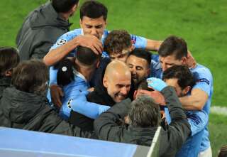 La joie des joueurs de Manchester City après leur deuxième but inscrit contre Dortmund en Ligue des champions, le 14 avril 2021.