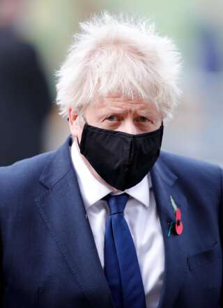 Boris Johnson, cas contact Covid-19, de nouveau à l'isolement (photo du 11 novembre 2020)