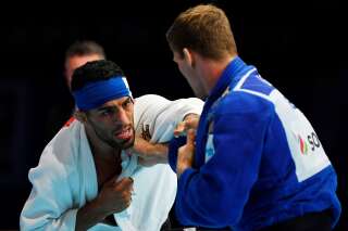 L'Iranien Saeid Mollaei (en blanc) lors de sa demi-finale des moins de 81 kg lors des championnats du monde de judo au Japon, le 28 août 2019.