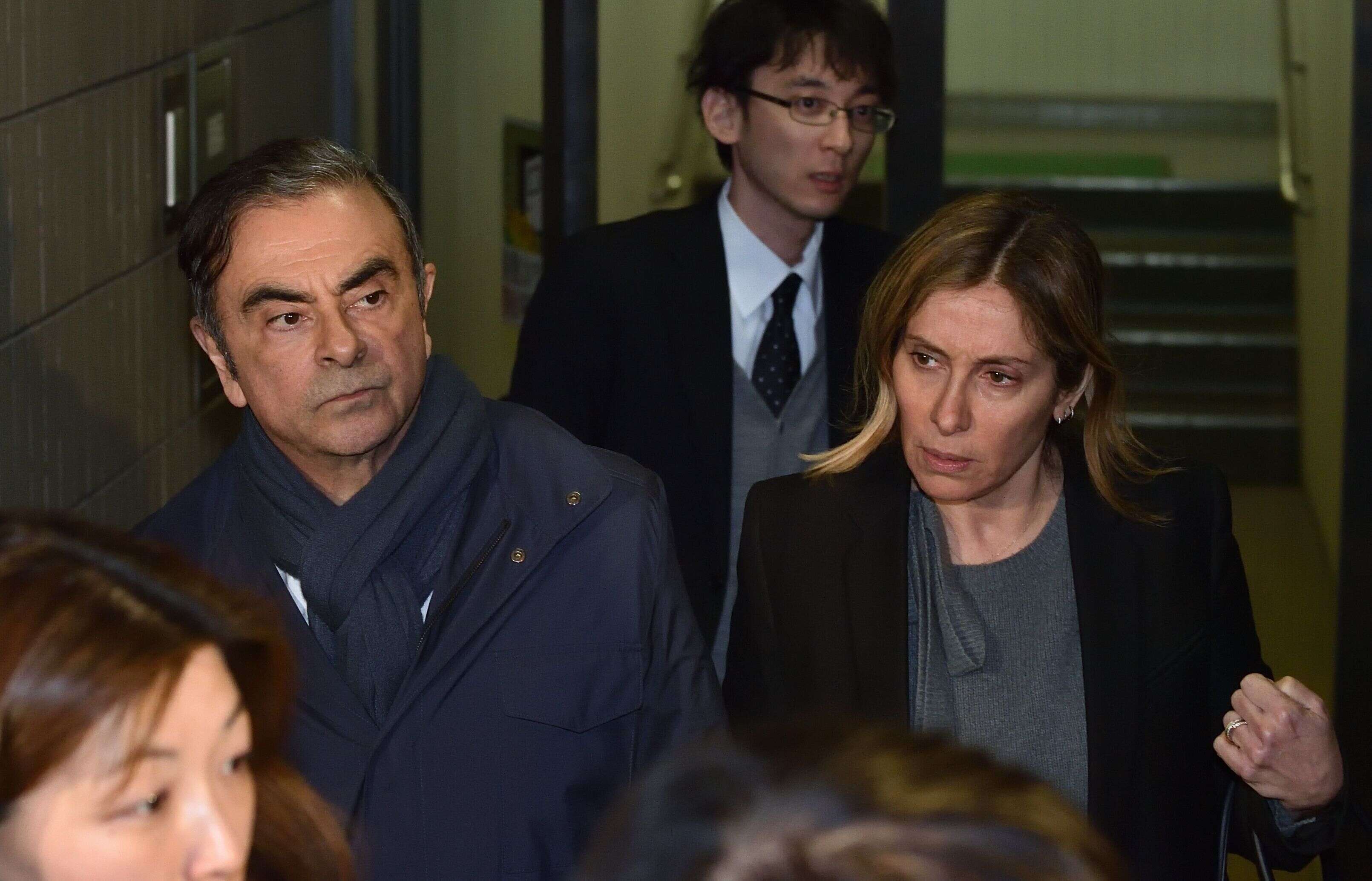 Carlos et Carole Ghosn en sortant de chez leur avocat à Tokyo le 3 avril 2019.