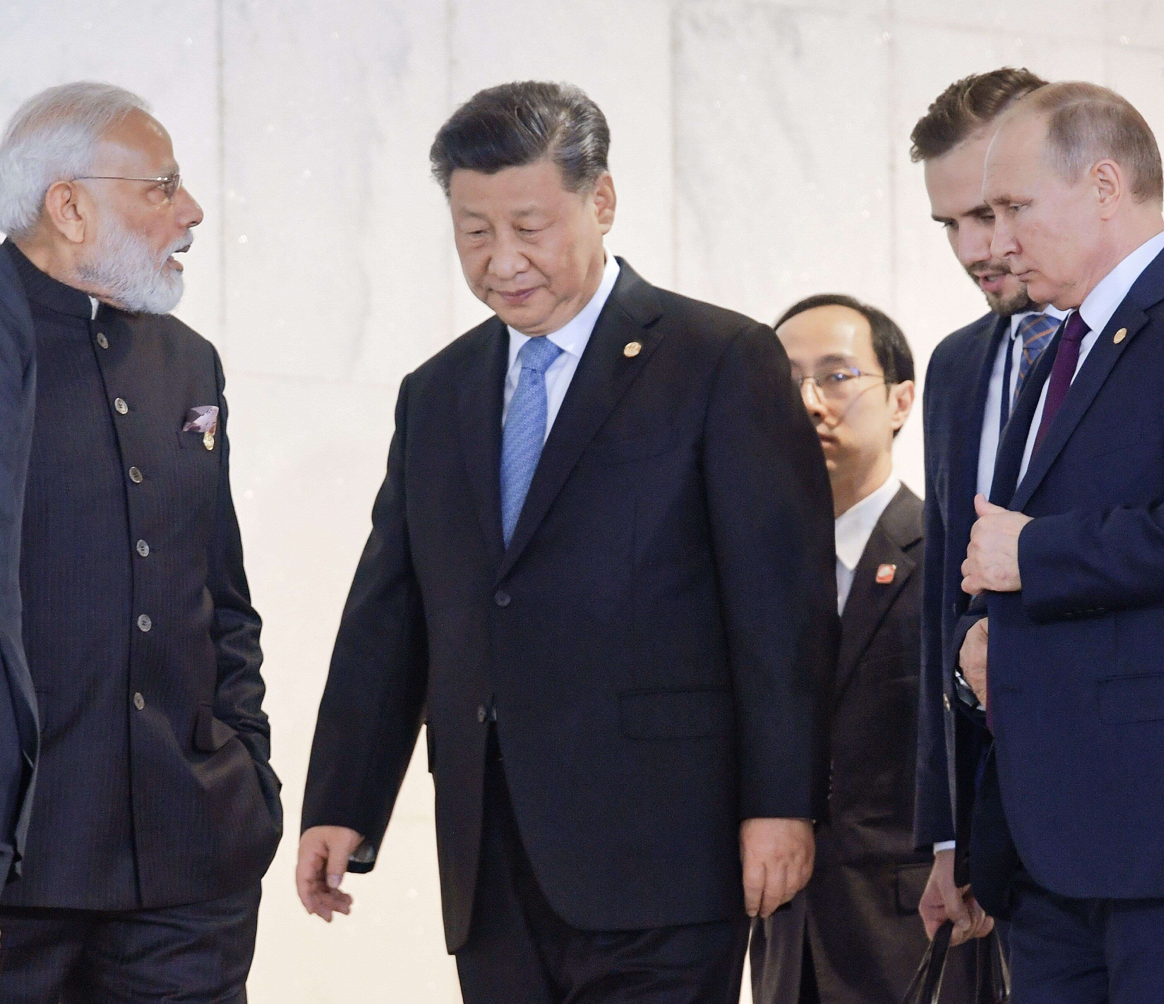 Le Premier ministre indien Narendra Modi, le président chinois Xi Jinping et son homologue russe Vladimir Poutine en visite au Brésil en novembre 2019.