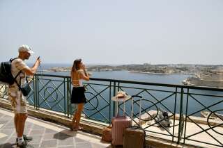 Des touristes à La Valette, capitale de Malte, le 1er juillet 2021.