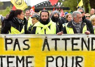 French singer and candidate for the upcoming European election Francis Lalanne (C) holds a banner during a yellow vests and alterglobalists demonstration on May 4, 2019 in Metz, eastern France, ahead of the G7 environment to be held on May 7 and 8. (Photo by JEAN-CHRISTOPHE VERHAEGEN / AFP)        (Photo credit should read JEAN-CHRISTOPHE VERHAEGEN/AFP/Getty Images)