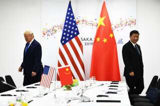 La Chine de Xi Jinping, ici lors du G20 à Osaka en juin 2019, à menacé les États-Unis de représailles après la promulgation d'une loi en faveur des manifestants.
