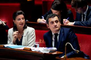 French Minister for Solidarity and Health Agnes Buzyn (L) and French Minister of Public Action and Accounts Gerald Darmanin (R) attend a session of questions to the government at the French National Assembly in Paris on October 25, 2017. / AFP PHOTO / Thomas Samson        (Photo credit should read THOMAS SAMSON/AFP/Getty Images)