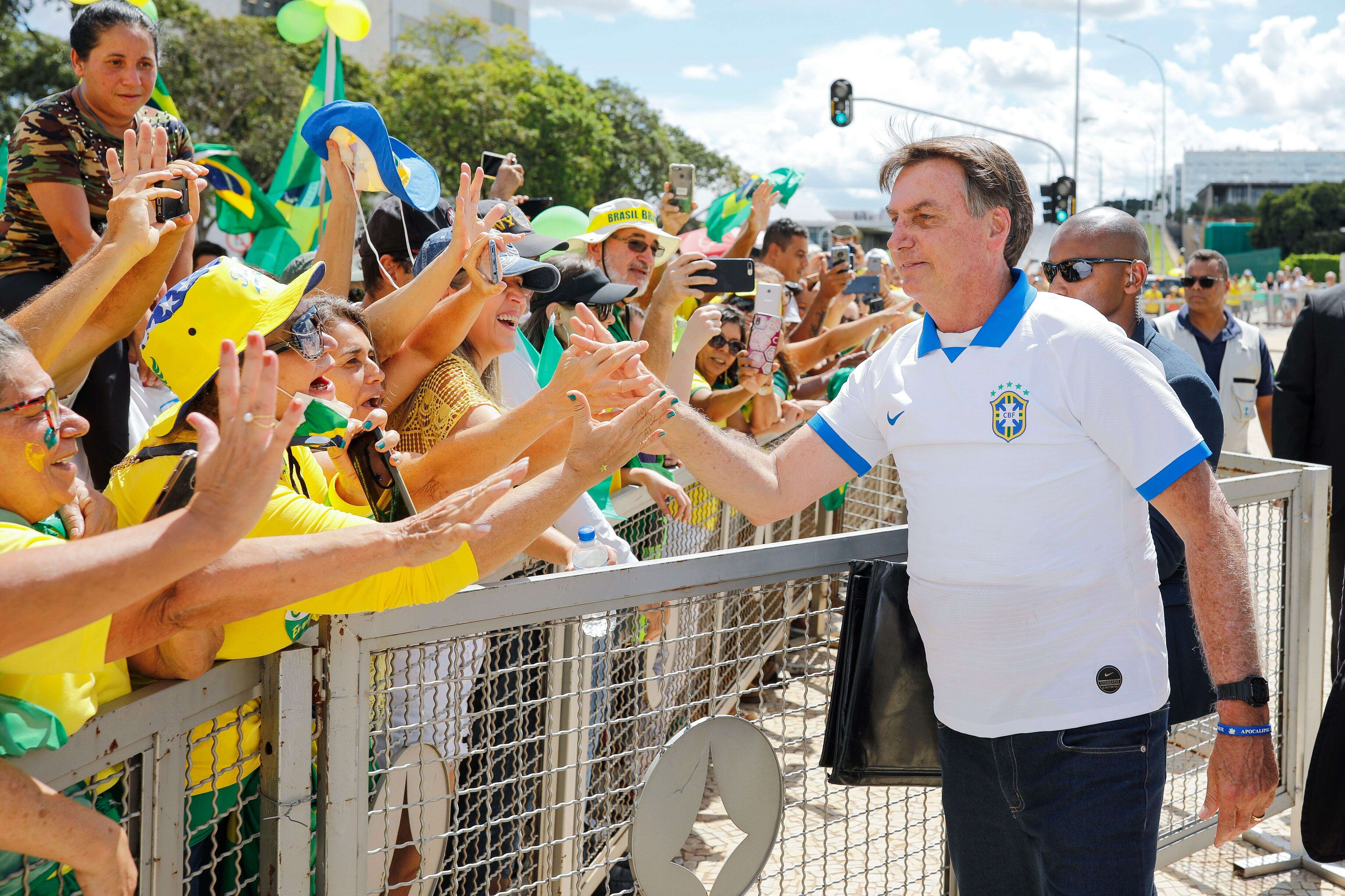 Jair Bolsonaro, ici à Brasilia lors d'un rassemblement de ses supporters, le 15 mars 2020.