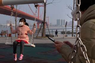 Une jeune fille à Wuhan en Chine le 29 janvier 2020.