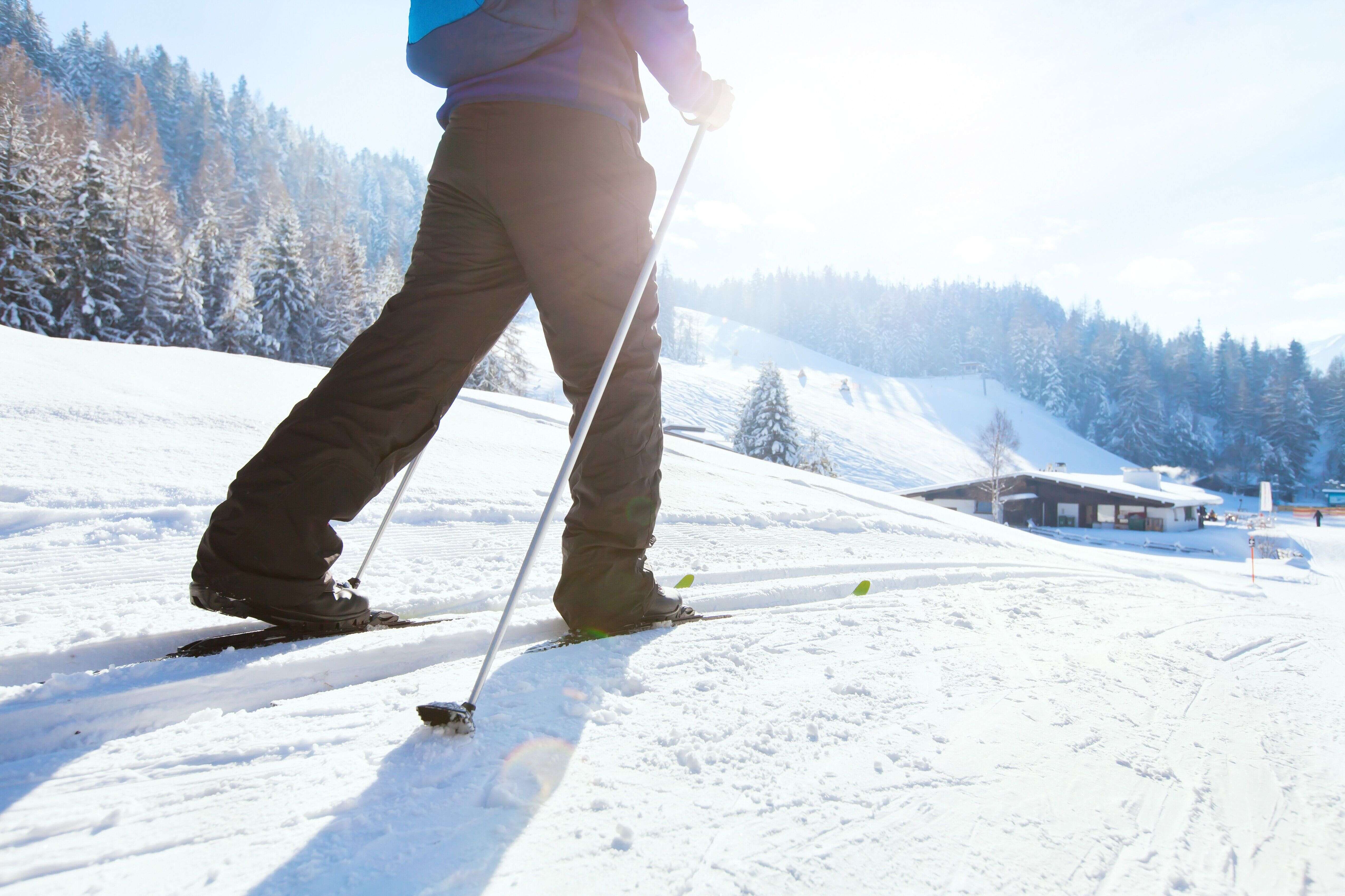 nordic skiing, winter holidays in Alps, cross country skier in mountains