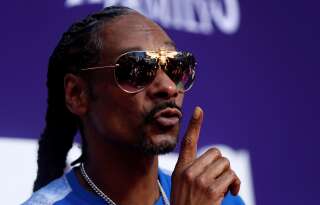 Rapper Snoop Dogg poses at the premiere of 