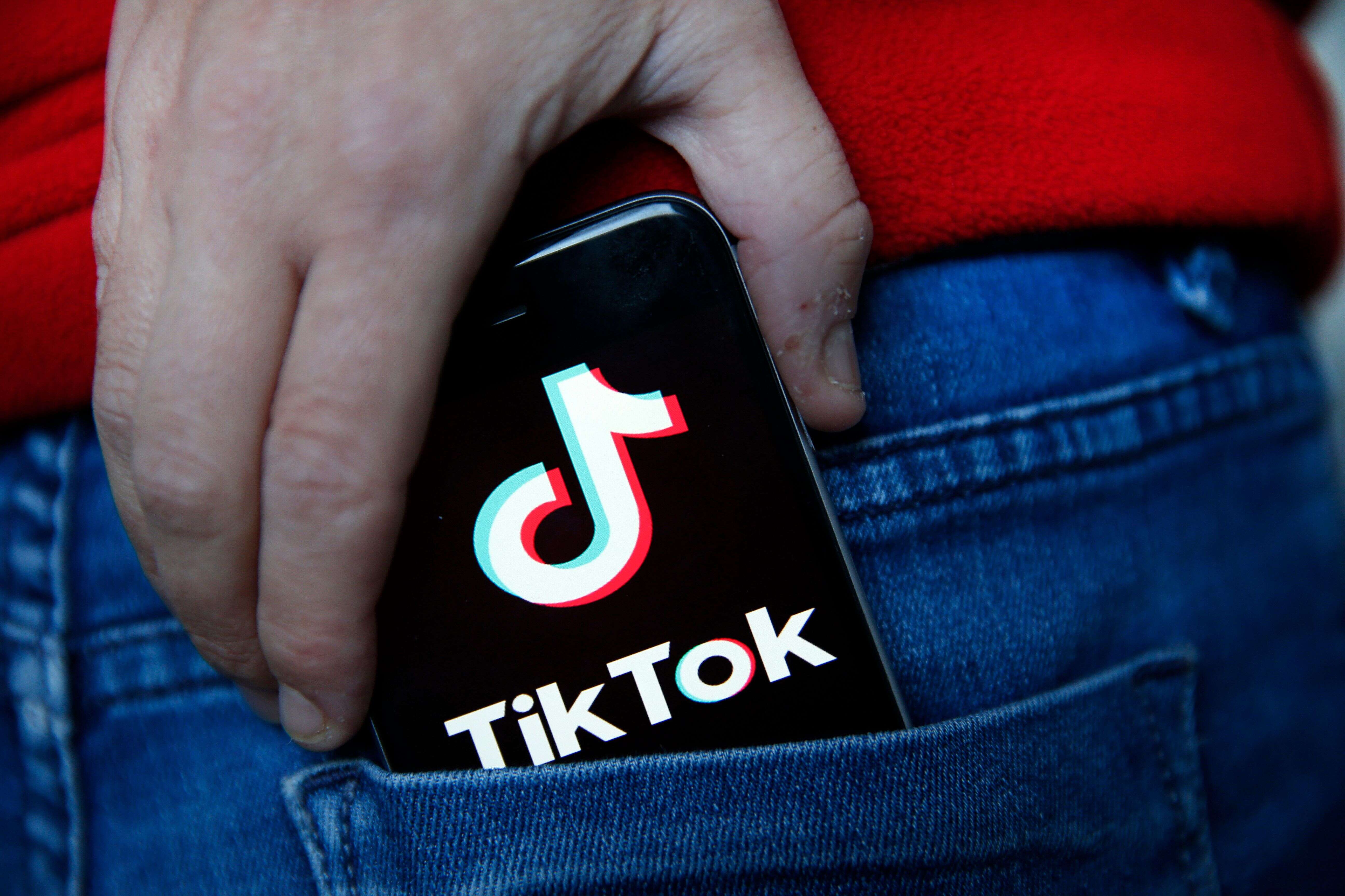 PARIS, FRANCE - NOVEMBER 20: In this photo illustration the logo of Chinese media app for creating and sharing short videos TikTok, also known as Douyin is displayed on the screen of a smartphone on November 20, 2019 in Paris, France. The social media TikTok developed by Chinese company ByteDance continues its meteoric rise and exceeded the milestone of 1.5 billion downloads. Tik Tok now surpasses Facebook and Instagram. (Photo by Chesnot/Getty Images)