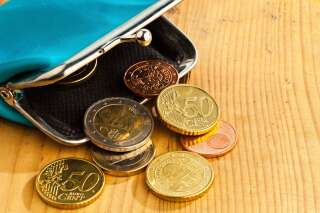 (GERMANY OUT) Eine leere Geldbörse mit wenigen Euromünzen. Symbolphoto für Schulden und Armut.  (Photo by Wodicka/ullstein bild via Getty Images)