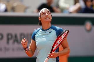 France's Caroline Garcia reacts after winning a point against Taylor Townsend of the U.S. during their first round match of the French Open tennis tournament at the Roland Garros stadium Tuesday, May 24, 2022 in Paris. (AP Photo/Jean-Francois Badias)