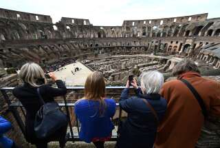 L'Italie, à contre-courant de ses voisins européens, a assoupli lundi les restrictions anti-Covid en vigueur dans la plupart de ses régions, permettant entre autres la réouverture du Colisée et de la Chapelle Sixtine à Rome. (Photo Vincenzo PINTO / AFP)
