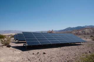 Surrounded by desert, the Photovoltaic Panels behind  the National Park Service Furnace Creek Visitor Centre in Death Valley contribute to making it a more efficient building in the hottest, driest and lowest place in the USA.