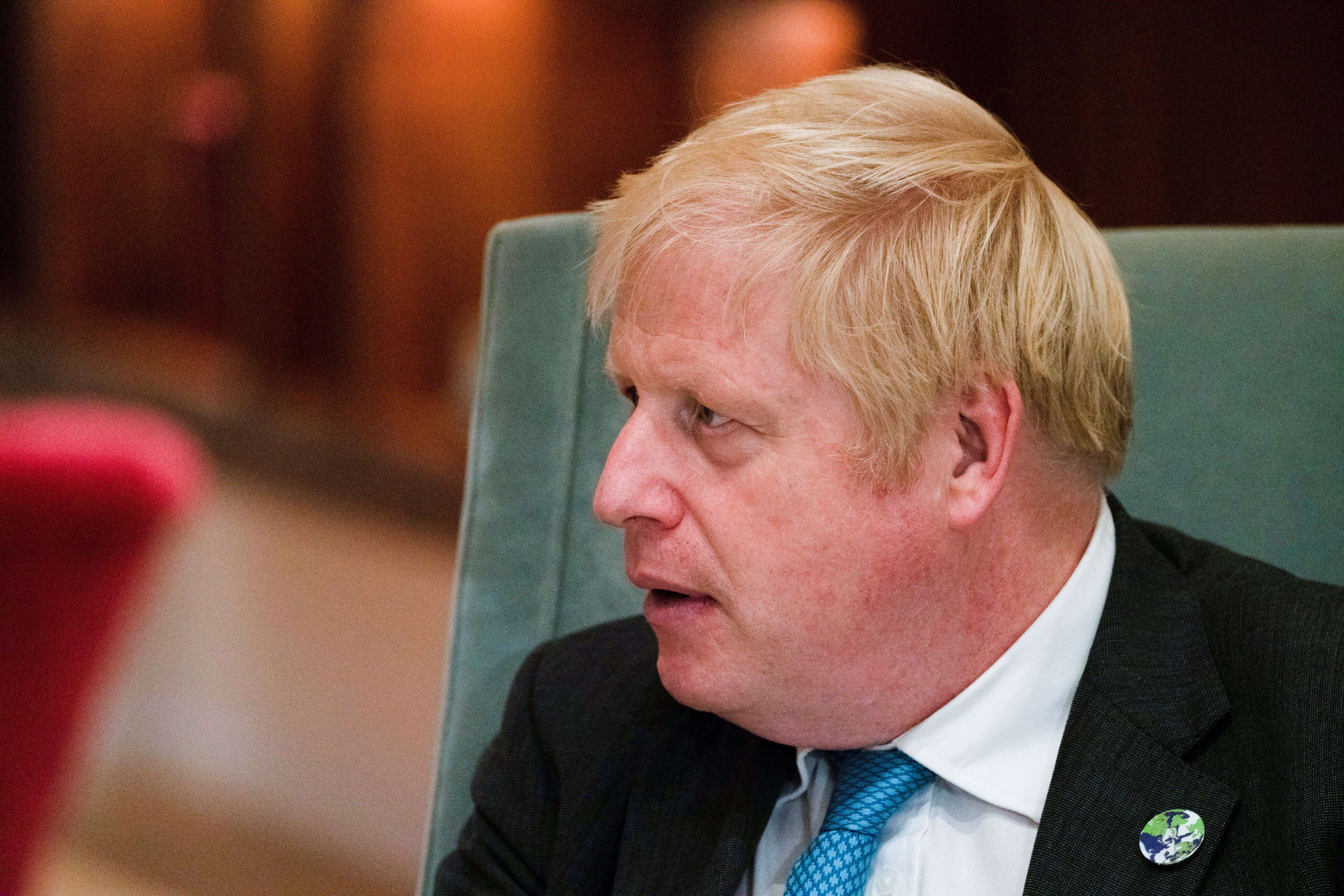 Boris Johnson (ici lors d'une réunion à l'ONU le 22 septembre) pourrait revoir sa politique en matière de visas, face aux pénuries qui frappent le Royaume-Uni. REUTERS/David 'Dee' Delgado