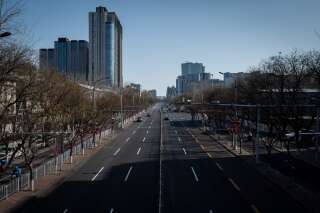 Une rue presque vide à Pékin, le 15 février 2020.