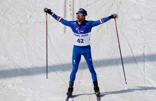 Beijing 2022 Winter Paralympic Games - Para Cross-Country Skiing - Men's Middle Distance Free Technique Standing - National Biathlon Centre, Zhangjiakou, China - March 12, 2022. Benjamin Daviet of France reacts after competing. REUTERS/Issei Kato