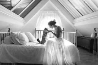 Photographer Marianna Zampieri and her cat Arthur took post-wedding self-portraits at their home.