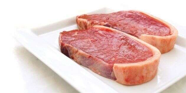 sirloin steaks on white plate