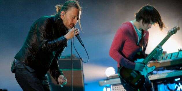 Thom Yorke, left, and Jonny Greenwood of Radiohead perform during the band's headlining set on the first weekend of the 2012 Coachella Valley Music and Arts Festival, Saturday, April 14, 2012, in Indio, Calif. (AP Photo/Chris Pizzello)