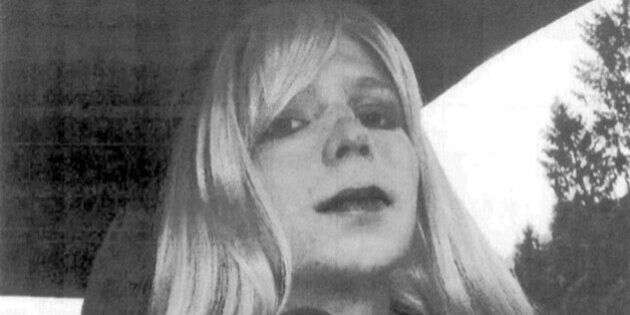 FILE - In this undated file photo provided by the U.S. Army, Pfc. Chelsea Manning poses for a photo wearing a wig and lipstick.  Manning is suing the Defense Department for hormone therapy. Lawyers for the Army private formerly known as Bradley Manning and the American Civil Liberties Union filed the lawsuit Tuesday, Sept. 23, 2014, in Washington. (AP Photo/U.S. Army, File)