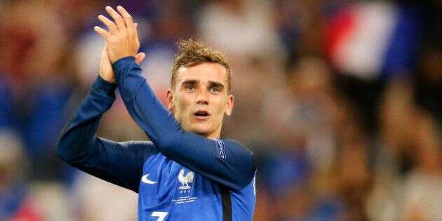 France's Antoine Griezmann acknowledges the supporter after his team won 2-0 during the Euro 2016 semifinal soccer match between Germany and France, at the Velodrome stadium in Marseille, France, Thursday, July 7, 2016. (AP Photo/Michael Probst)