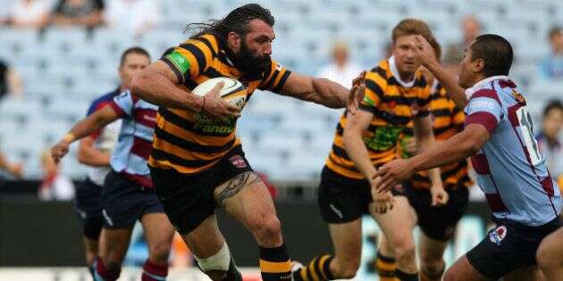 SYDNEY, AUSTRALIA - FEBRUARY 25:  Sebastien Chabal of Balmain runs the ball during the Sydney Grade Rugby match between Balmain and Petersham at ANZ Stadium on February 25, 2012 in Sydney, Australia.  (Photo by Cameron Spencer/Getty Images)