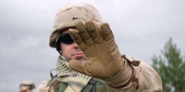 the us soldier showing arm to...