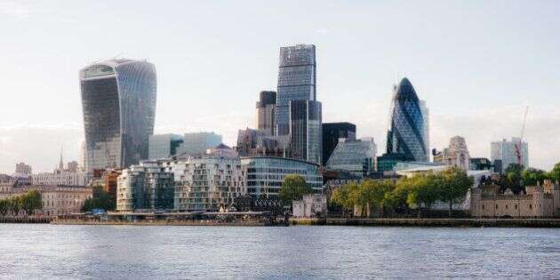 London financial district with the river Themse in the foreground.
