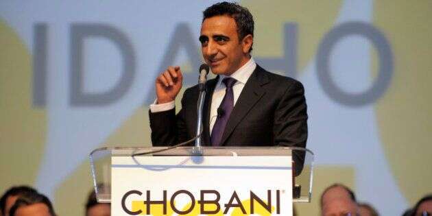 Hamdi Ulukaya, founder and chief executive officer of Chobani, addresses nearly 2,000 attendees during the grand opening celebration of the world's largest yogurt manufacturing plant, Monday, Dec. 17, 2012, in Twin Falls, Idaho. Chobani's nearly 1 million square foot yogurt plant was built in just 326 days.  Jack Dempsey/Invision for Chobani/AP Images
