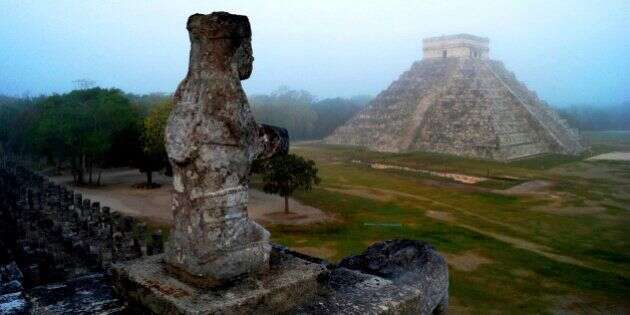 The Maya temple of Kukulkan, the feathered serpent and Mayan snake deity, is seen at the archaeological site of Chichen Itza, in the southern Mexican state of Yucatan, in this picture taken May 3, 2012 and made available to Reuters on December 17, 2012. Dec. 21 marks the end of an age in a 5,125 year-old Maya calendar, an event that is variously interpreted as the end of days, the start of a new era or just a good excuse for a party. Thousands of New Age mystics, spiritual adventurers and canny businessmen are converging on ancient ruins in southern Mexico and Guatemala to find out what will happen. Picture taken May 3, 2012. REUTERS/Mauricio Marat/National Institute of Anthropology and History (INAH)/Handout (MEXICO - Tags: SOCIETY RELIGION) FOR EDITORIAL USE ONLY. NOT FOR SALE FOR MARKETING OR ADVERTISING CAMPAIGNS. THIS IMAGE HAS BEEN SUPPLIED BY A THIRD PARTY. IT IS DISTRIBUTED, EXACTLY AS RECEIVED BY REUTERS, AS A SERVICE TO CLIENTS