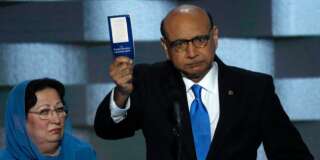 Khizr Khan, whose son, Humayun S. M. Khan was one of 14 American Muslims who died serving in the U.S. Army  in the 10 years after the 9/11 attacks, offers to loan his copy of the Constitution to Republican U.S. presidential nominee Donald Trump, as he speaks while a relative looks on during the last night of the Democratic National Convention in Philadelphia, Pennsylvania, U.S. July 28, 2016. REUTERS/Mike Segar