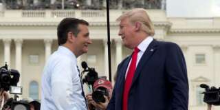 Republican presidential candidate Donald Trump and Republican presidential candidate Sen. Ted Cruz, R-Texas, greet each other on stage during a rally organized by Tea Party Patriots in on Capitol Hill in Washington, Wednesday, Sept. 9, 2015, to oppose the Iran nuclear agreement. (AP Photo/Carolyn Kaster)