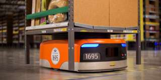 Les robots de la société Kiva qu'Amazon a acheté en 2012.
