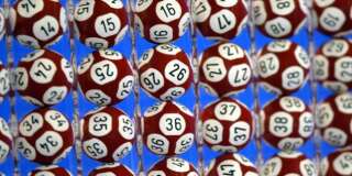 Balls are seen during a rehearsal for the new Euro-million loto draw at Boulogne-Billancourt near Paris February 13, 2004. The Euro-million loto will be played simultaneously in [England, Spain] and France with a weekly French draw with a possible jackpot of over 30 million euros (35 million dollars).