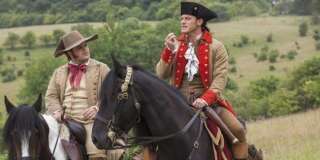 Josh Gad (Le Fou) et Luke Evans (Gaston) dans