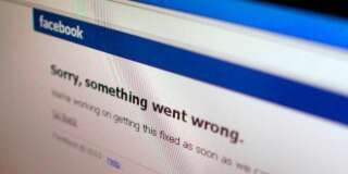 A Facebook error message is seen in this illustration photo of a computer screen in Singapore June 19, 2014.  Facebook Inc's website appeared to be back up on Thursday a few minutes after it displayed a message saying