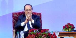 In this photo provided by Egypt's state news agency MENA, French President Francois Hollande, left, and Egyptian President Abdel-Fattah el-Sissi, right, applaud during an economic conference in Cairo, Egypt, Monday, April 18, 2016. In Egypt as part of a three-nation Middle East tour, the French leader was accompanied by a large business delegation. He and el-Sissi are expected to sign accords in the fields of energy, infrastructure and culture, according to an Egyptian presidential statement. (MENA via AP)