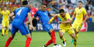Football Soccer - France v Romania - EURO 2016 - Group A - Stade de France, Saint-Denis near Paris, France - 10/6/16 France's Dimitri Payet in action with Romania's Florin Andone REUTERS/Christian Hartmann Livepic