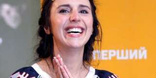 Ukraine's Jamala smiles as she speaks to the media upon her arrival at Borispil international airport outside in Kiev, Ukraine, Sunday, May 15, 2016. Ukrainian singer Jamala's melancholic tune about Soviet dictator Josef Stalin's 1944 deportation of the Crimean Tatars was crowned the winner of the 2016 Eurovision Song Contest early Sunday, an unusual choice for the kitschy pop fest. Susana Jamaladinova, a 32-year-old trained opera singer who uses the stage name Jamala, received the highest score of 534 points for her song
