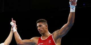 2016 Rio Olympics - Boxing - Semifinal - Men's Heavy (91kg) Semifinals Bout 159 - Riocentro - Pavilion 6 - Rio de Janeiro, Brazil - 13/08/2016. Tony Yoka (FRA) of France reacts after winning his bout. REUTERS/Peter Cziborra FOR EDITORIAL USE ONLY. NOT FOR SALE FOR MARKETING OR ADVERTISING CAMPAIGNS.
