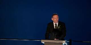 Australia's Prime Minister Tony Abbot talks during the Dawn Service ceremony at the Anzac Cove beach in Gallipoli peninsula, Turkey, early Saturday, April 25, 2015. Anzac Cove is a small cove on the Gallipoli peninsula and the site of World War I landing of the ANZACs (Australian and New Zealand Army Corps) on April, 25, 1915. World leaders gathered with the descendants of the fighters in Gallipoli, the memories of one of the most harrowing campaigns of the 20th century have come surging back to life. The doomed Allied offensive to secure a naval route from the Mediterranean to Istanbul through the Dardanelles, and take the Ottomans out of the war, resulted in over 130,000 deaths on both sides. (AP Photo/Lefteris Pitarakis)