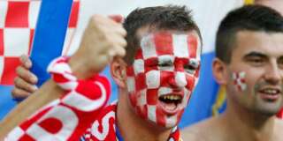 A Croatia fan cheers prior to  during the Euro 2012 soccer championship Group C match between Croatia and Spain in Gdansk, Poland, Monday, June 18, 2012. (AP Photo/Michael Sohn)