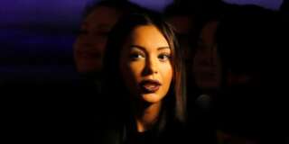 Model and reality TV personality Nabilla attends the presentation of Jean-Paul Gaultier's ready-to-wear Spring/Summer 2014 fashion collection, presented Saturday, Sept. 28, 2013 in Paris. (AP Photo/Jacques Brinon)